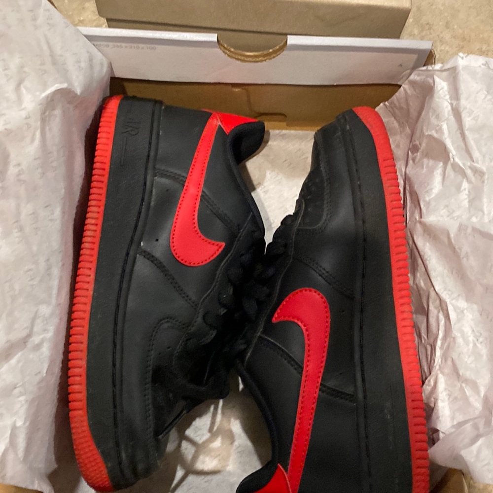 Kids Nike Air Force 1s size 3.5. Black red gently worn.